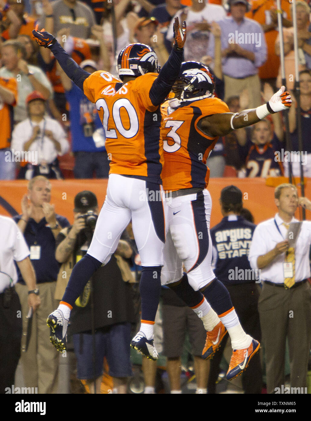 Denver Broncos safety Mike Adams and linebacker Steven Johnson celebrate Denver blocking a Baltimore Ravens punt during the third quarter at Sports Authority Field at Mile High for the NFL Kickoff game in Denver on September 5, 2013.  Denver defeated the defending Super Bowl champions Baltimore 49-27.     UPI/Gary C. Caskey Stock Photo