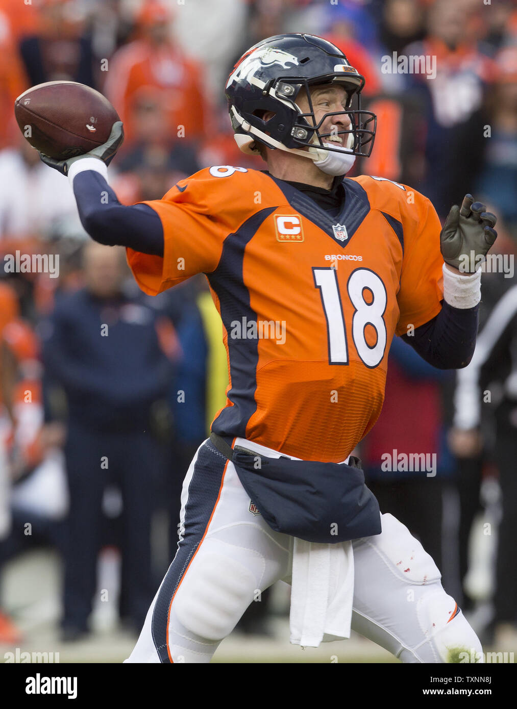 Denver Broncos Peyton Manning throws against the New England Patriots  during the AFC Championship game at Sport Authority Field at Mile High in  Denver on January 24, 2016. Denver advances to Super