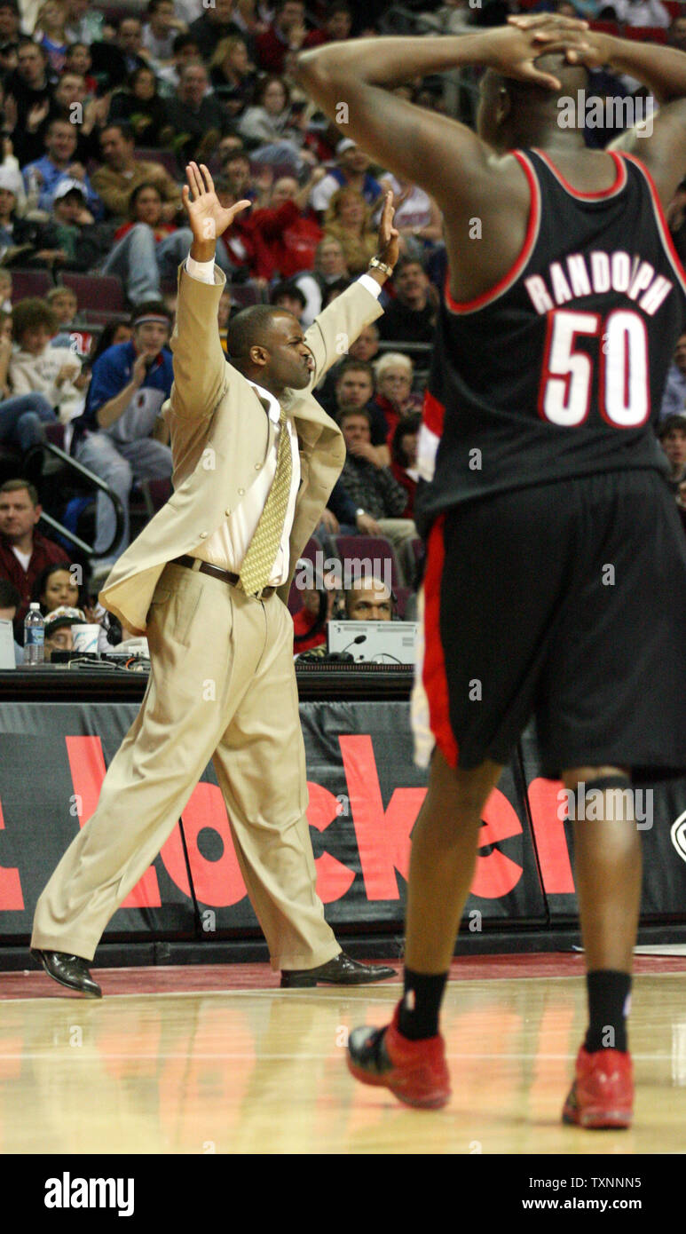 Portland Trail Blazers coach Nate McMillan argues a foul call with the referee in the fourth quarter as Trail Blazers forward Zach Randolph (50) walks toward him December 20, 2005 at The Palace of Auburn Hills, Michigan.  (UPI Photo/Scott R. Galvin) Stock Photo