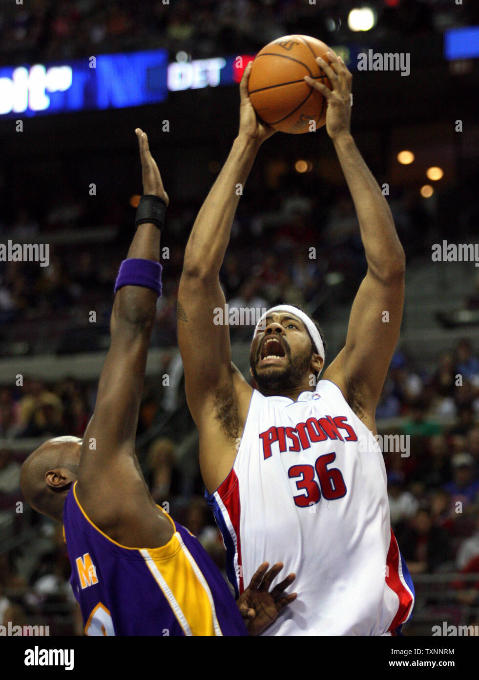 Detroit Pistons forward Rasheed Wallace (36) takes the ball to the hoop against Los Angeles Lakers forward Lamar Odom in the fourth quarter at The Palace of Auburn Hills in Auburn Hills, MI on January 29, 2006.  The Pistons defeated the Lakers 102-93.  (UPI Photo/Scott R. Galvin) Stock Photo