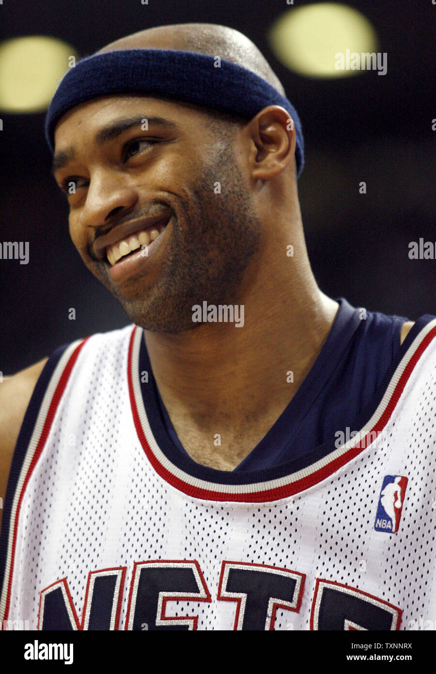 New Jersey Nets guard Vince Carter puases for a laugh against the Detroit Pistons in the second quarter at the Palace of Auburn Hills in Auburn, Mi on February 14, 2006.  (UPI Photo/Scott R. Galvin) Stock Photo