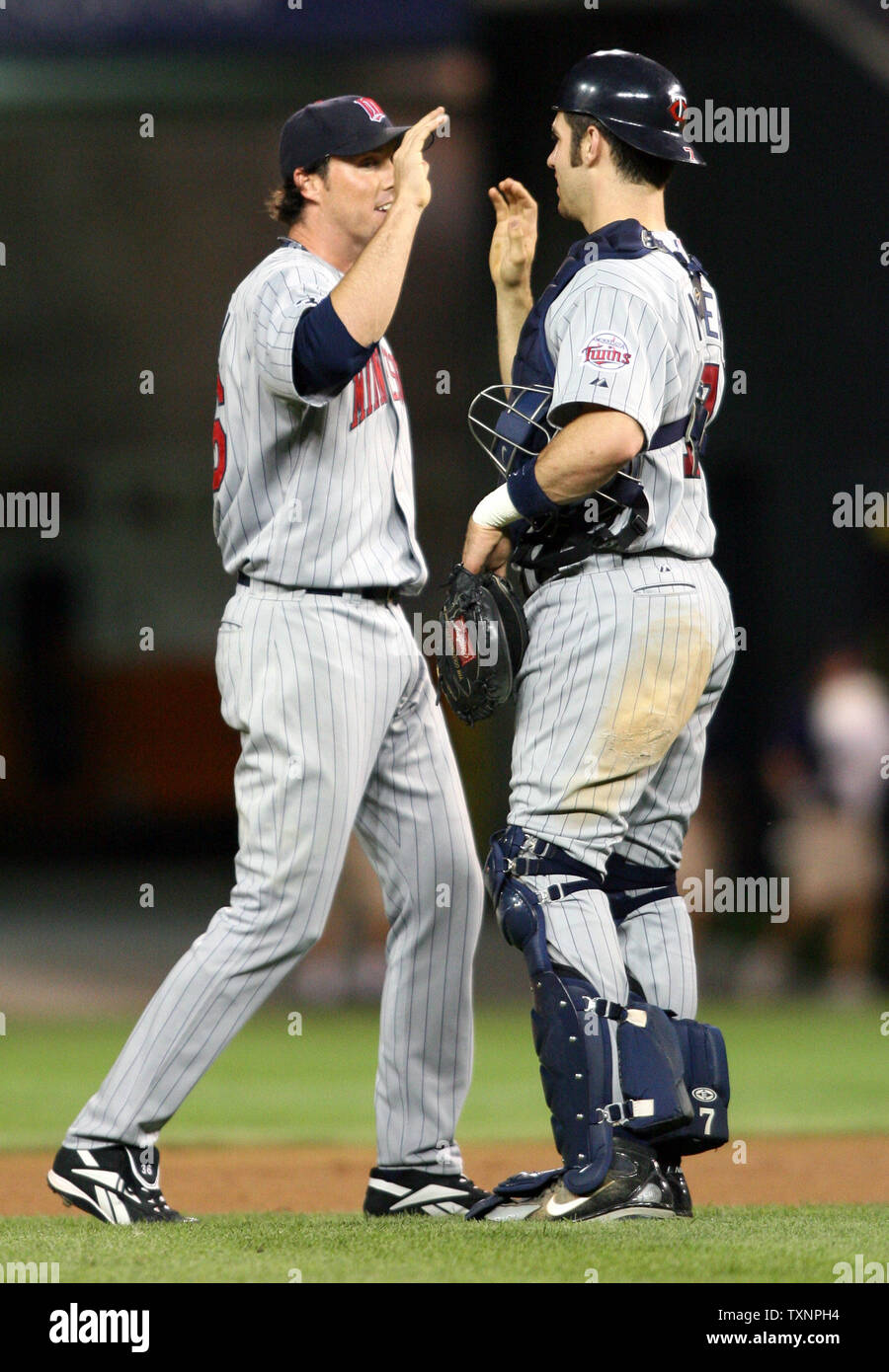 Joe Mauer puts on the tools of ignorance once last time. Greatest catcher  Twins history!