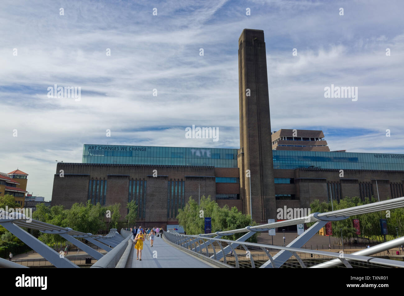 New Tate Modern art gallery from the Millenium Bridge, London, England on a late spring morning. Stock Photo