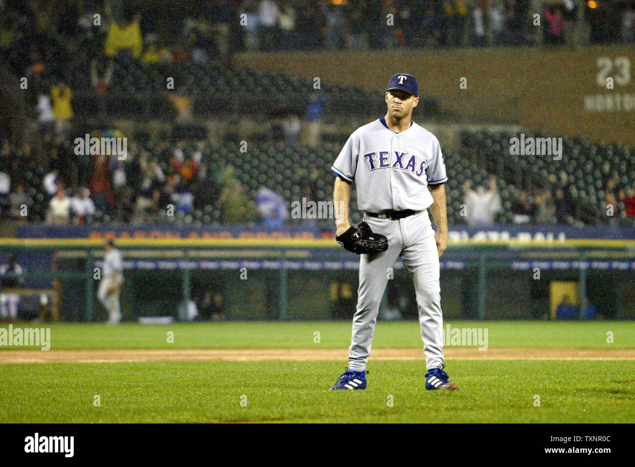 Detroit Tigers relief pitcher Joe Nathan walks to the dugout after