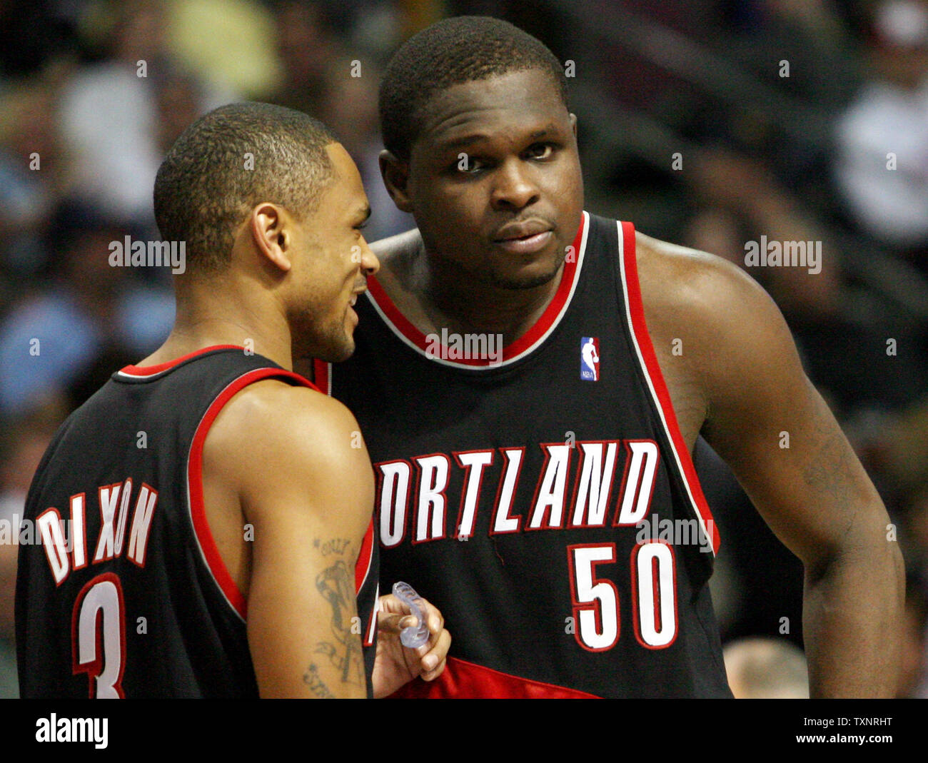 Portland Trail Blazers Juan Dixon (3) talks with teammate Zach Randolph (50) during a timeout in the third quarter against the Detroit Pistons at The Palace of Auburn Hills in Auburn Hills, Michigan on December 5, 2006.  The Trail Blazers defeated the Piston 88-85.  (UPI Photo/Scott R. Galvin) Stock Photo