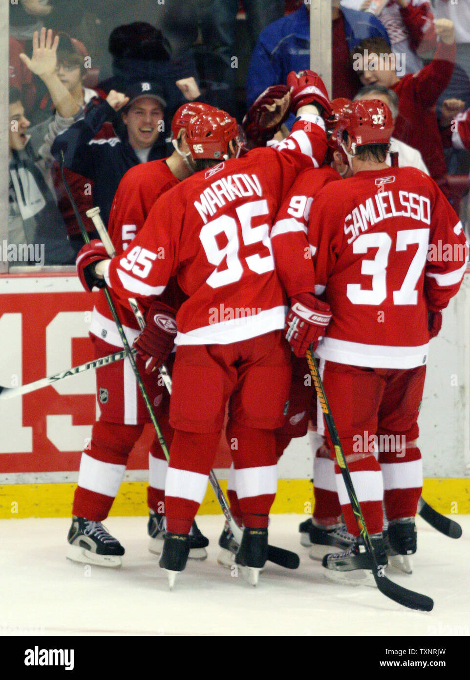 Detroit Red Wings left wing Henrik Zetterberg gets congratulated by  teammates after scoring a third-period goal against the Anaheim Mighty  Ducks in game six of the NHL Western Conference Finals in Anaheim