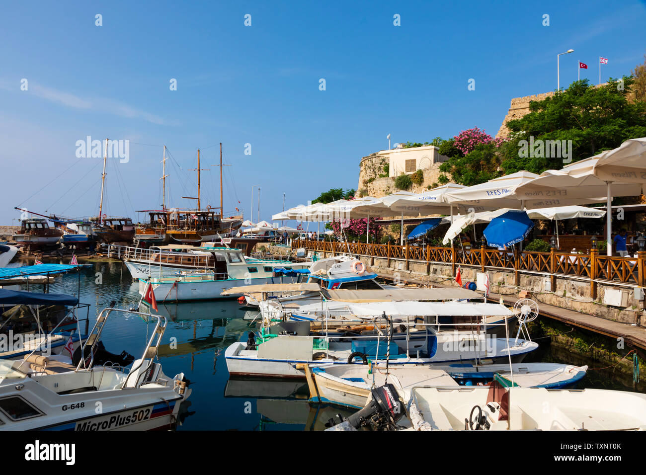 tavernas line the harbour front, Kyrenia, Girne, Turkish Republic of Northern Cyprus. Stock Photo