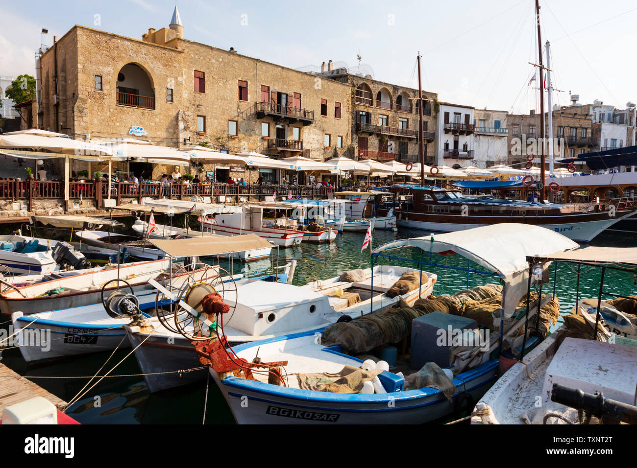 tavernas line the harbour front, Kyrenia, Girne, Turkish Republic of Northern Cyprus. Stock Photo