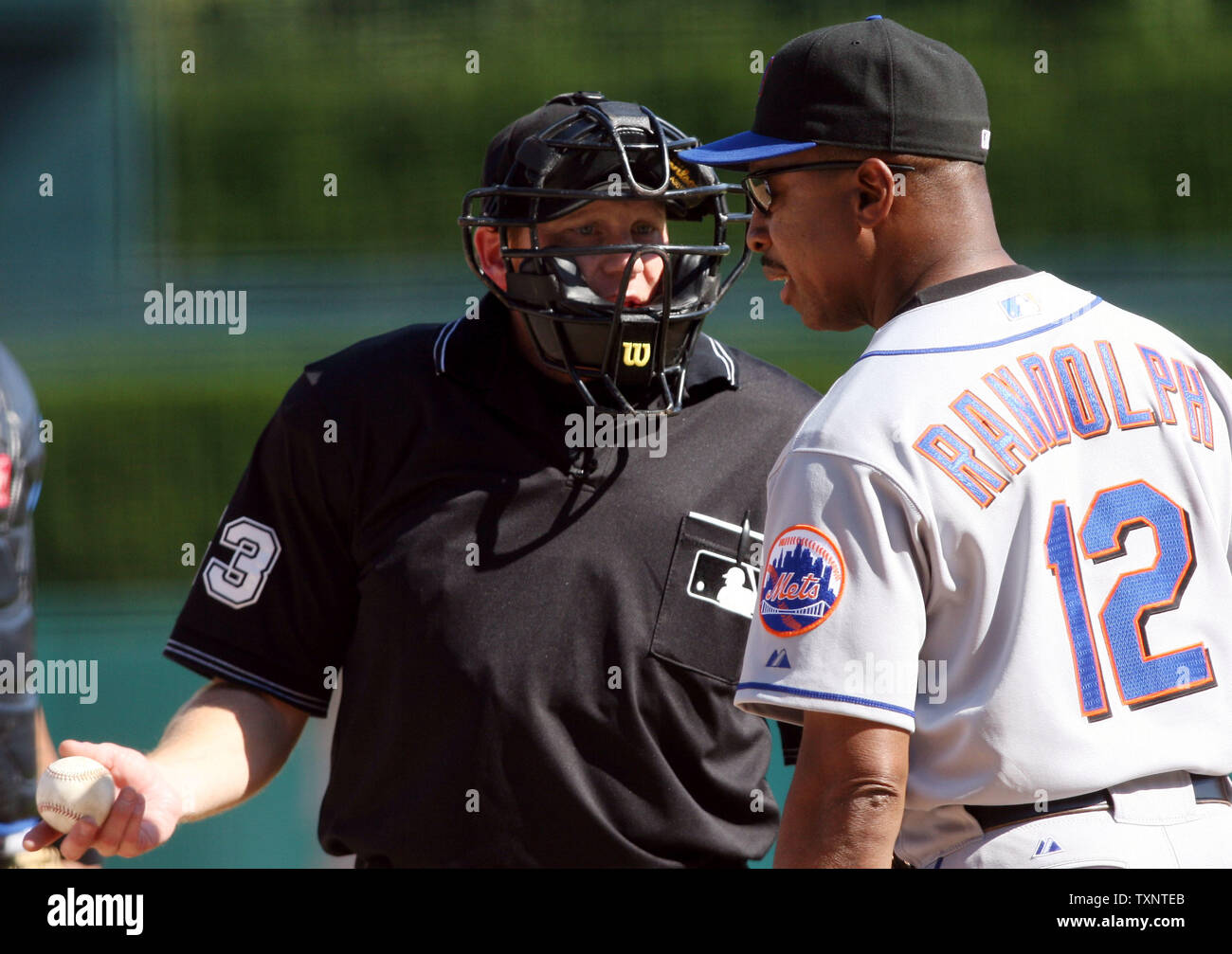 New York Mets manager Willie Randolph (12) talks with home plate umpire Paul Schrieber in the third inning against the Detroit Tigers at Comerica Park in Detroit on June 9, 2007.  (UPI Photo/Scott R. Galvin) Stock Photo