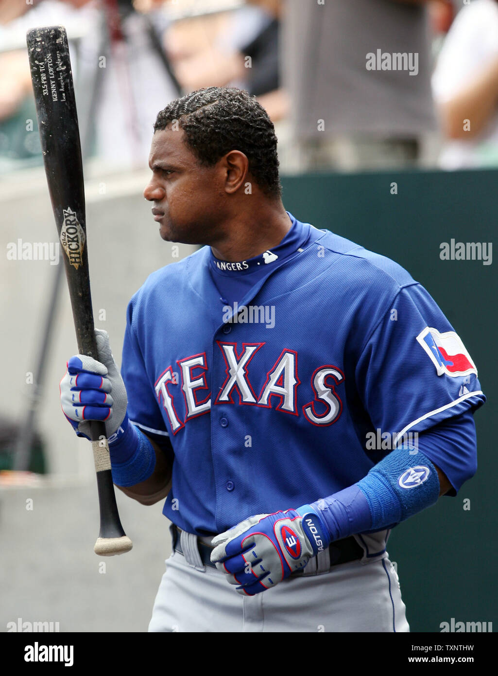 Texas Rangers' Sammy Sosa walks around the dugout in the third inning as he  waits for his turn at bat against the Detroit Tigers at Comerica Park in  Detroit on June 28,