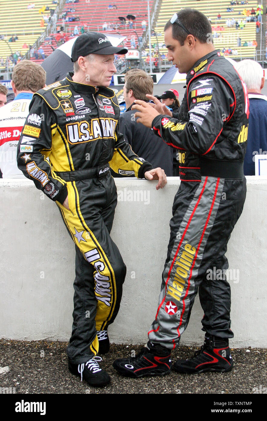 Nascar drivers Mark Martin, left, and Juan Pablo Montoya chat during driver introductions for the 3M Performance 400 at the Michigan International Speedway in Brooklyn, Michigan on August 19, 2007.  The race was postponed due to continuous rain at the track.  (UPI Photo/Scott R. Galvin) Stock Photo