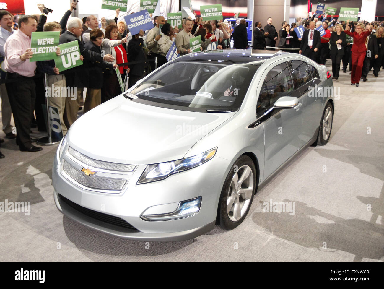 The Chevy Volt Drives Past Reporters And General Motors Employees 