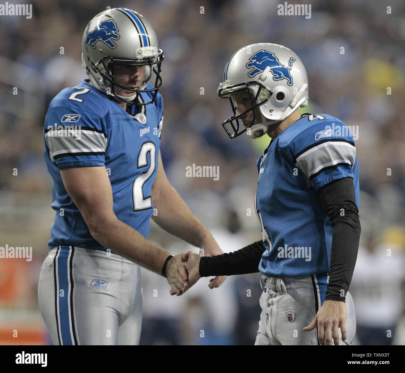 Detroit Lions placekicker Jason Hanson reacts after missing a 49