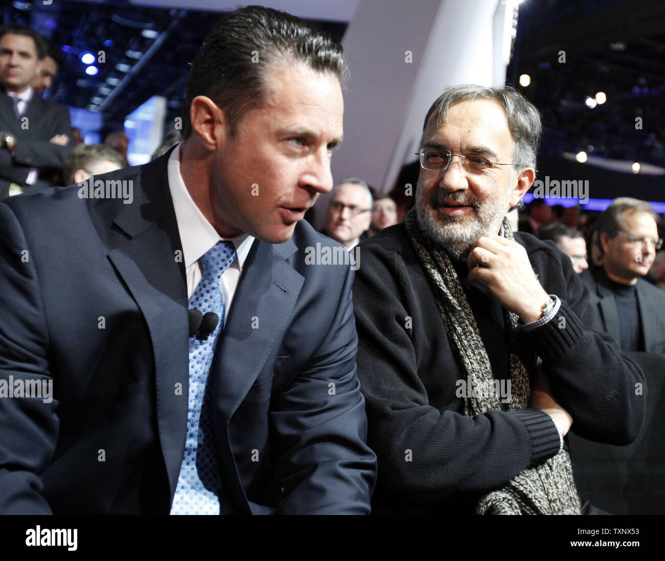 Sergio Marchionne, right, Chairman and CEO of Chrysler Group and Fiat talks with Reid Bigland, left, President and CEO of Dodge before their presentation to reveal the new Dodge Dart at the 2012 North American International Auto Show at the Cobo Center in Detroit, January 9, 2012. UPI/Mark Cowan Stock Photo