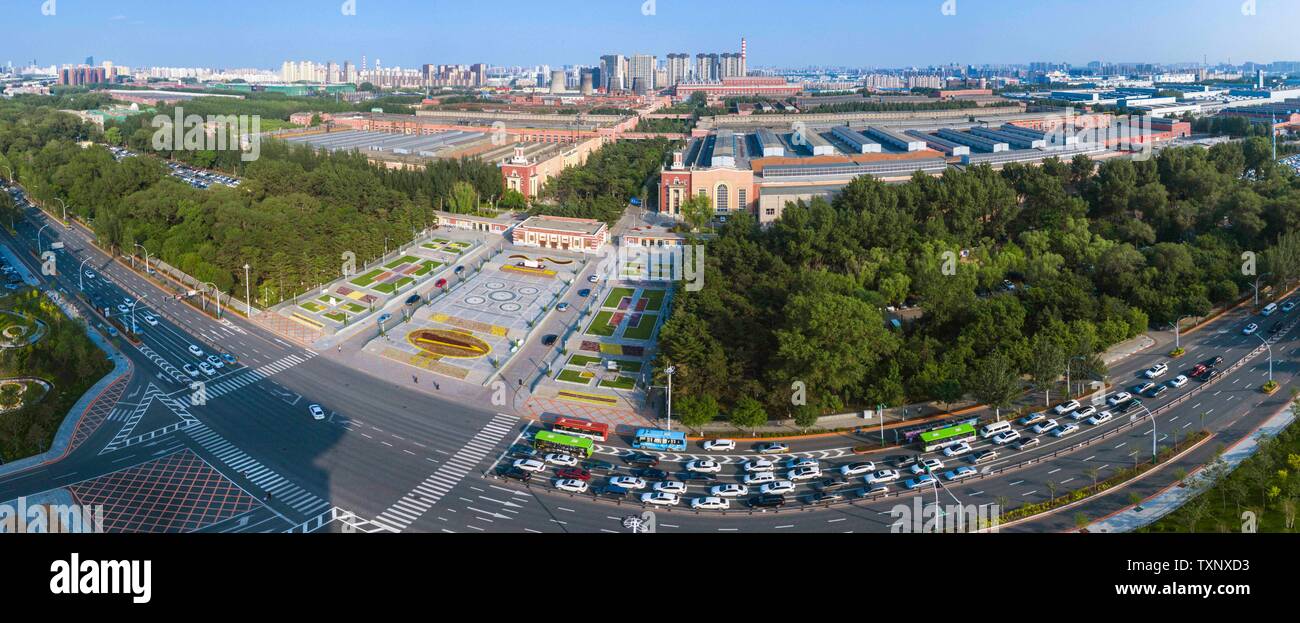 Changchun. 12th June, 2019. Stitched aerial photo taken on June 12, 2019 shows the view of the factory estate of China's First Automobile Workshop (FAW) in Changchun, northeast China's Jilin Province. China's leading automaker FAW Group has made a dent in a series of 'surgical reforms' related to its personnel system and brand reconstruction. Credit: Xu Chang/Xinhua/Alamy Live News Stock Photo