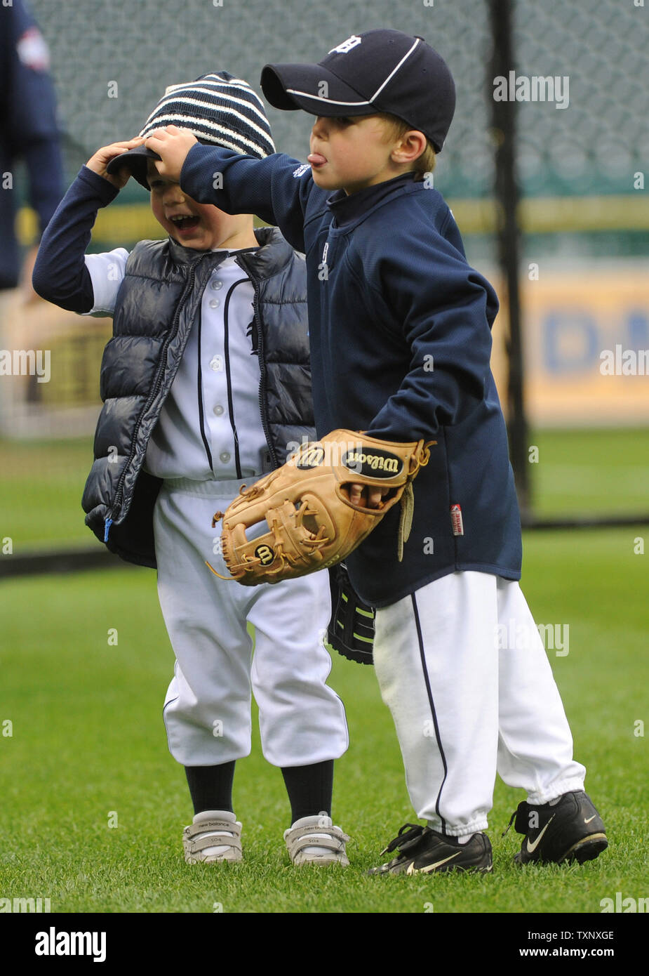 Bret Kelly (L), the son of Detroit Tigers out fielder Don Kelly, and Gage Brookens, the grandson of Tigers first base coach Tom Brookens, play on the field during Tigers' batting practice a day before game 3 of the World Series against the San Francisco Giants 8-3 at Comerica Park in Detroit on October 26, 2012. The Giants lead the series 2-0.  UPI/Kevin Dietsch Stock Photo