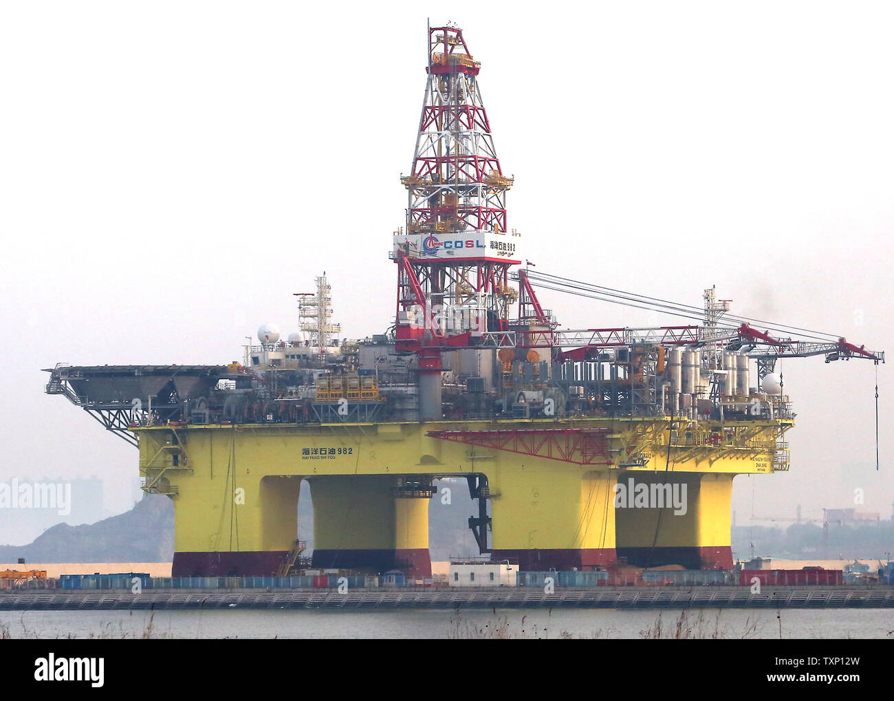 The construction of a petrochemical drilling rig is near completion on ...