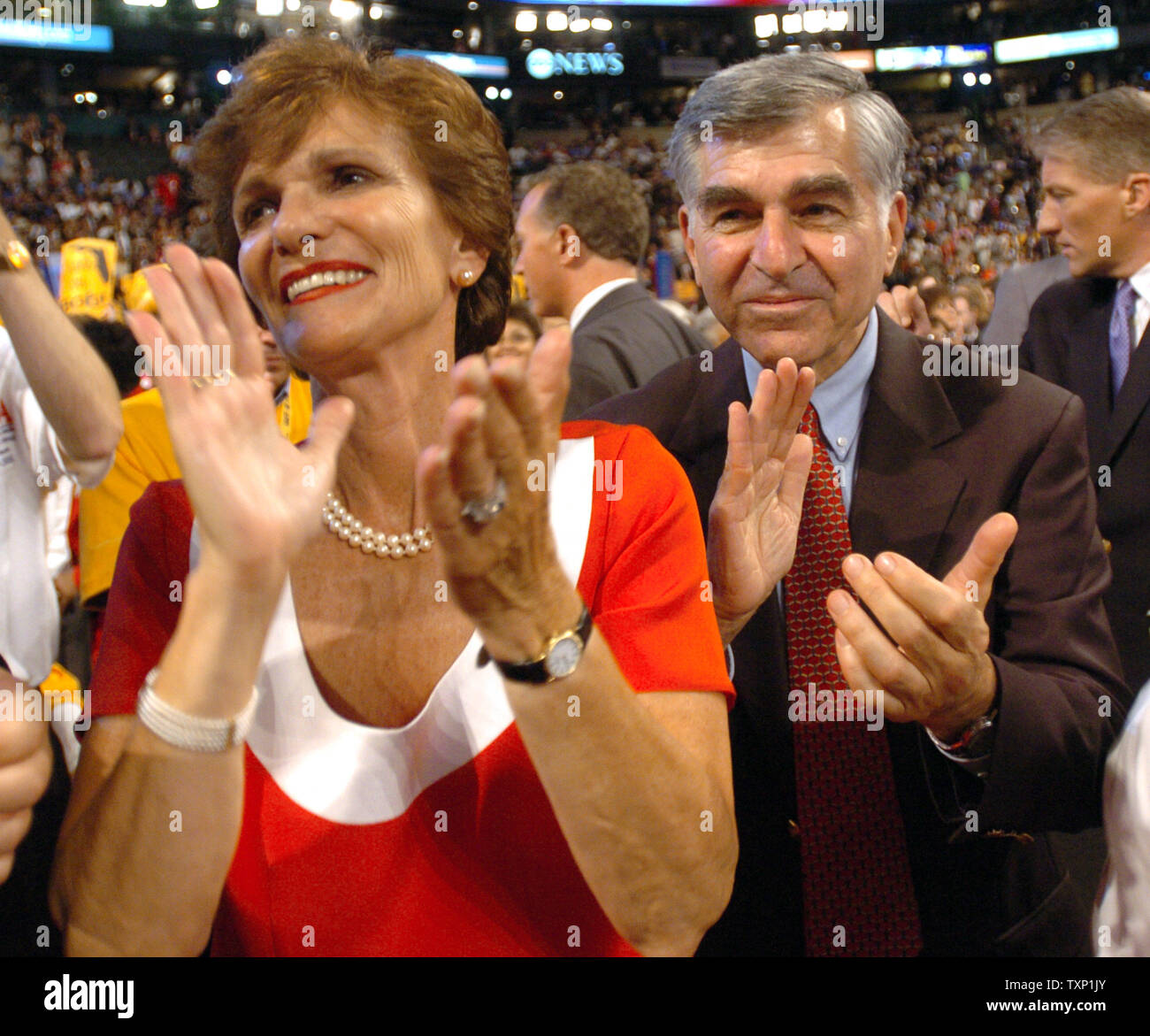 Former Mass. Gov. Michael Dukakis and his wife Kitty applaud speakers on day three of the Democratic National Convention at the FleetCenter in Boston on July 28, 2004.  (UPI Photo/Greg Whitesell) Stock Photo