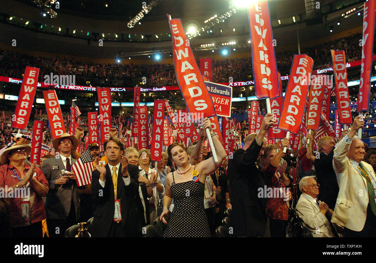 Delegates chear for their Vice Presidential Candidate Sen. John Edwards of North Carolina on July 28, 2004, on the third day of the Democratic National Convention at the FleetCenter in Boston.   (UPI Photo/GREG WHITESELL) Stock Photo