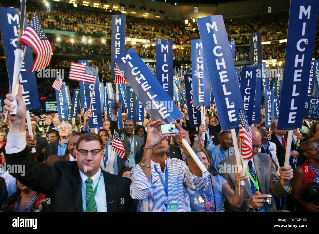 Delegates Wave Flags And Michelle Signs As Michelle Obama Wife