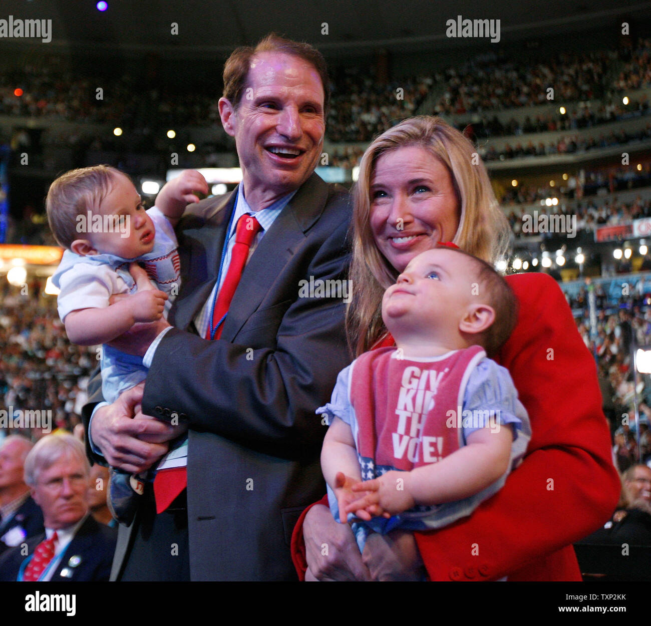 Sen. Ron Wyden (D-OR) and his wife Nancy hold their 10-month-old twins William (L) and Ava (R) as they bring them up close to the stage at the 2008 Democratic National Convention  in Denver, Colorado on August 26, 2008. (UPI Photo/Brian Kersey) Stock Photo