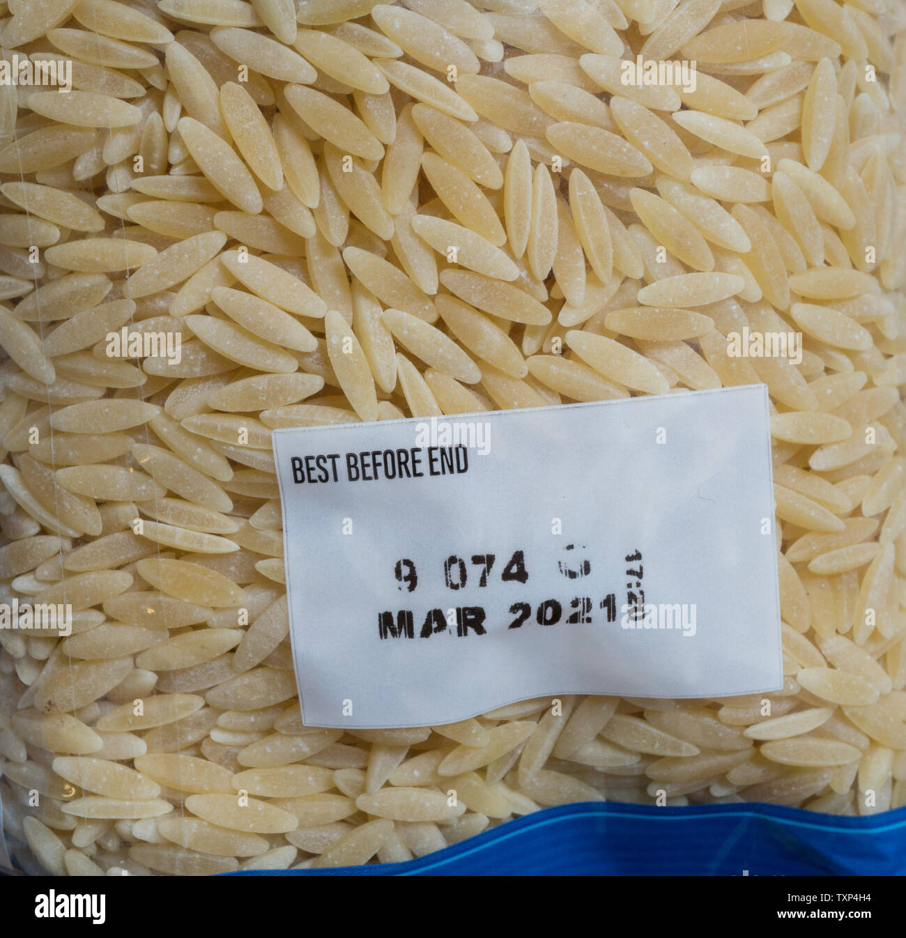 Rice in plastic packing with Best Before End date. UK Stock Photo