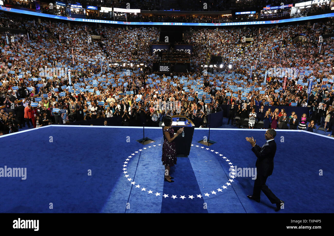 President Barack Obama walks to his wife First Lady Michelle Obama before giving his acceptance speech during the 2012 Democratic National Convention at the Time Warner Cable Arena in Charlotte, North Carolina on September 6, 2012.          UPI/Scott Andrews   POOL Stock Photo