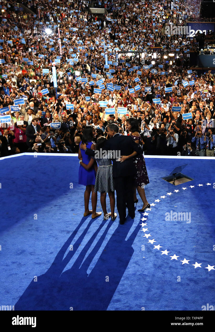 President Barack Obama hugs his family after giving his acceptance speech during the 2012 Democratic National Convention at the Time Warner Cable Arena in Charlotte, North Carolina on September 6, 2012.          UPI/Scott Andrews   POOL Stock Photo