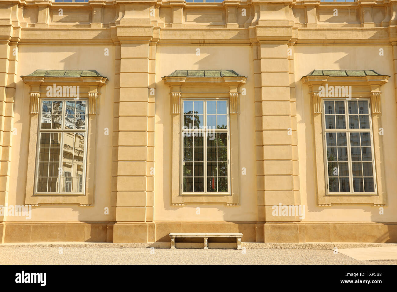 Bench in the front of the windows of Palais Liechtenstein in Vienna Stock Photo