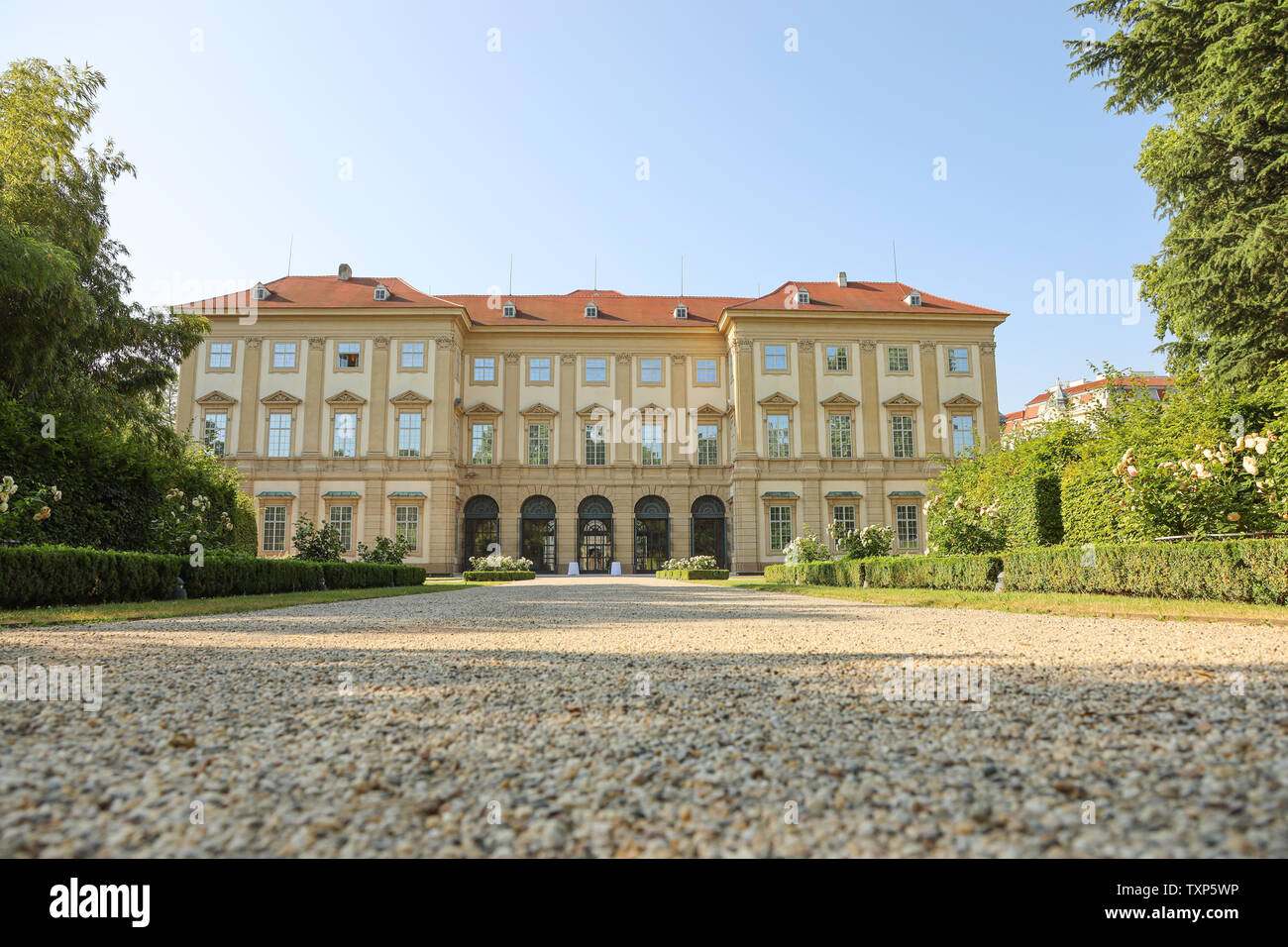 Back view of Palais Liechtenstein, surrounded by the park Stock Photo