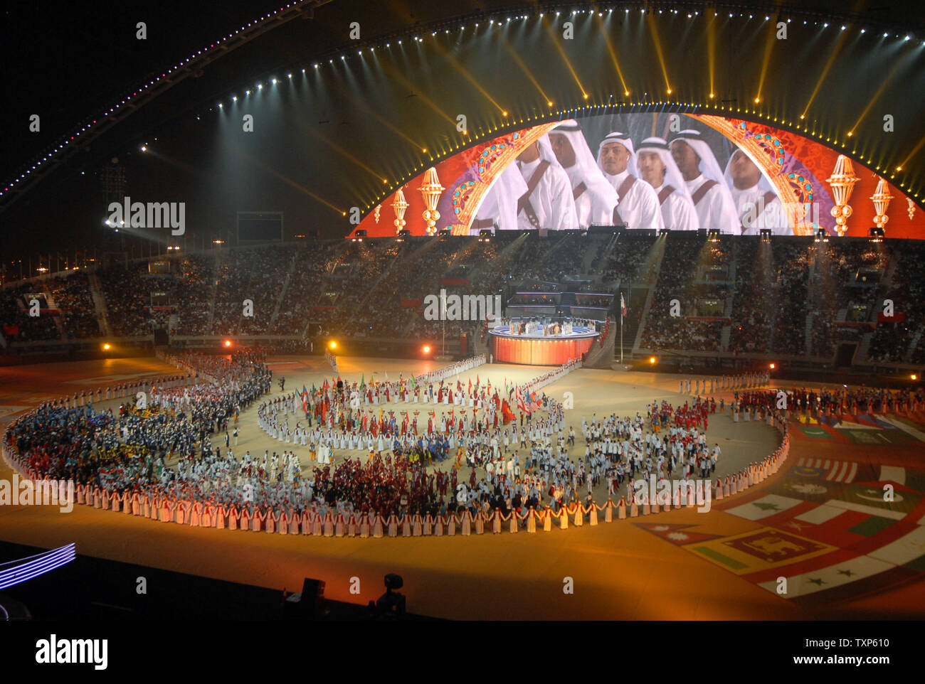 The Athletes Entering The Stadium During The Closing Ceremony Of The 15 Asian Games In Doha Qatar On Friday December 15 2006 The Next Asian Games Will Be Held In Guanzhou China