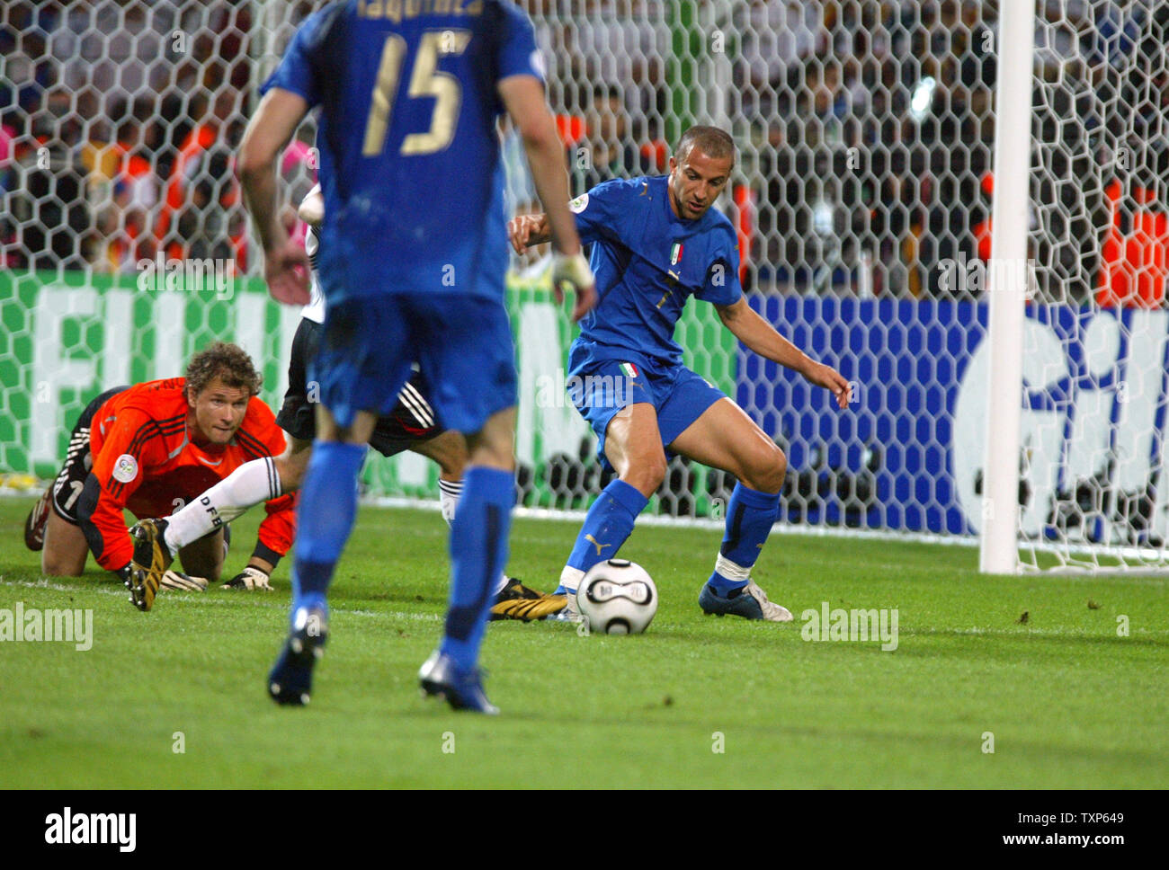 Alessandro Del Piero of Italy (7) beats German keeper Jens Lehmann during World Cup soccer in Dortmund, Germany on July 4, 2006.  Italy defeated Germany 2-0.   (UPI Photo/Arthur Thill) Stock Photo