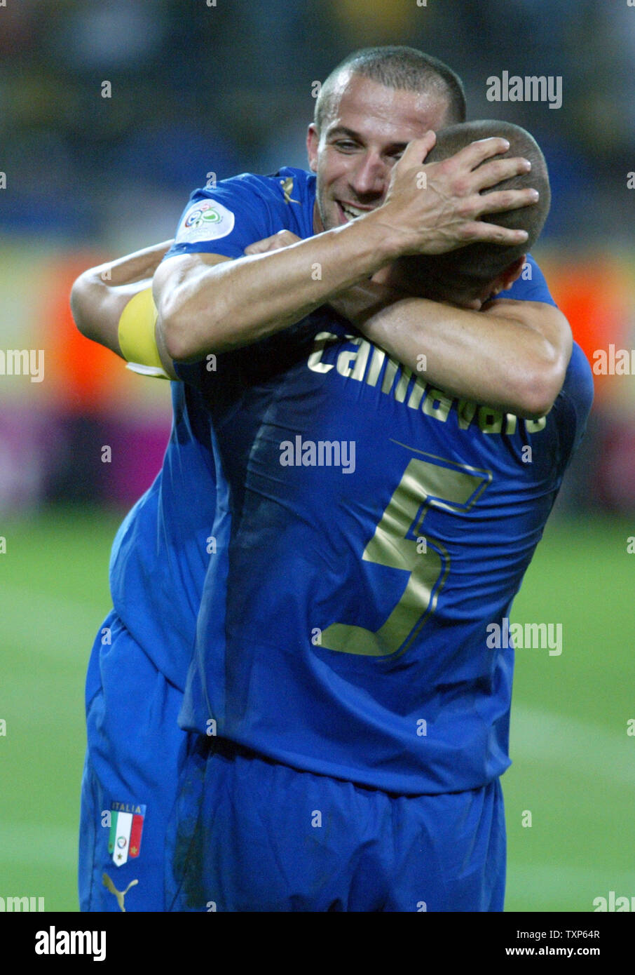 Fabio Cannavaro (5) and Alessandro Del Piero(7) celebrate  victory for the Italian team during World Cup soccer in Dortmund, Germany on July 4, 2006.  Italy defeated Germany 2-0.   (UPI Photo/Arthur Thill) Stock Photo