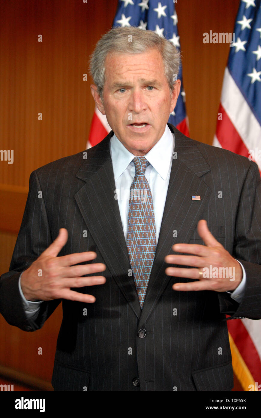Washington, D.C. - July 3, 2007 -- United States President George W. Bush makes a statement after visiting wounded military personnel at Walter Reed Army Medical Center in Washington, D.C. on Tuesday, July 3, 2007.  He took 2 questions on the commutation of the jail sentence of Lewis I. 'Scooter' Libby. Credit: Ron Sachs / CNP Stock Photo
