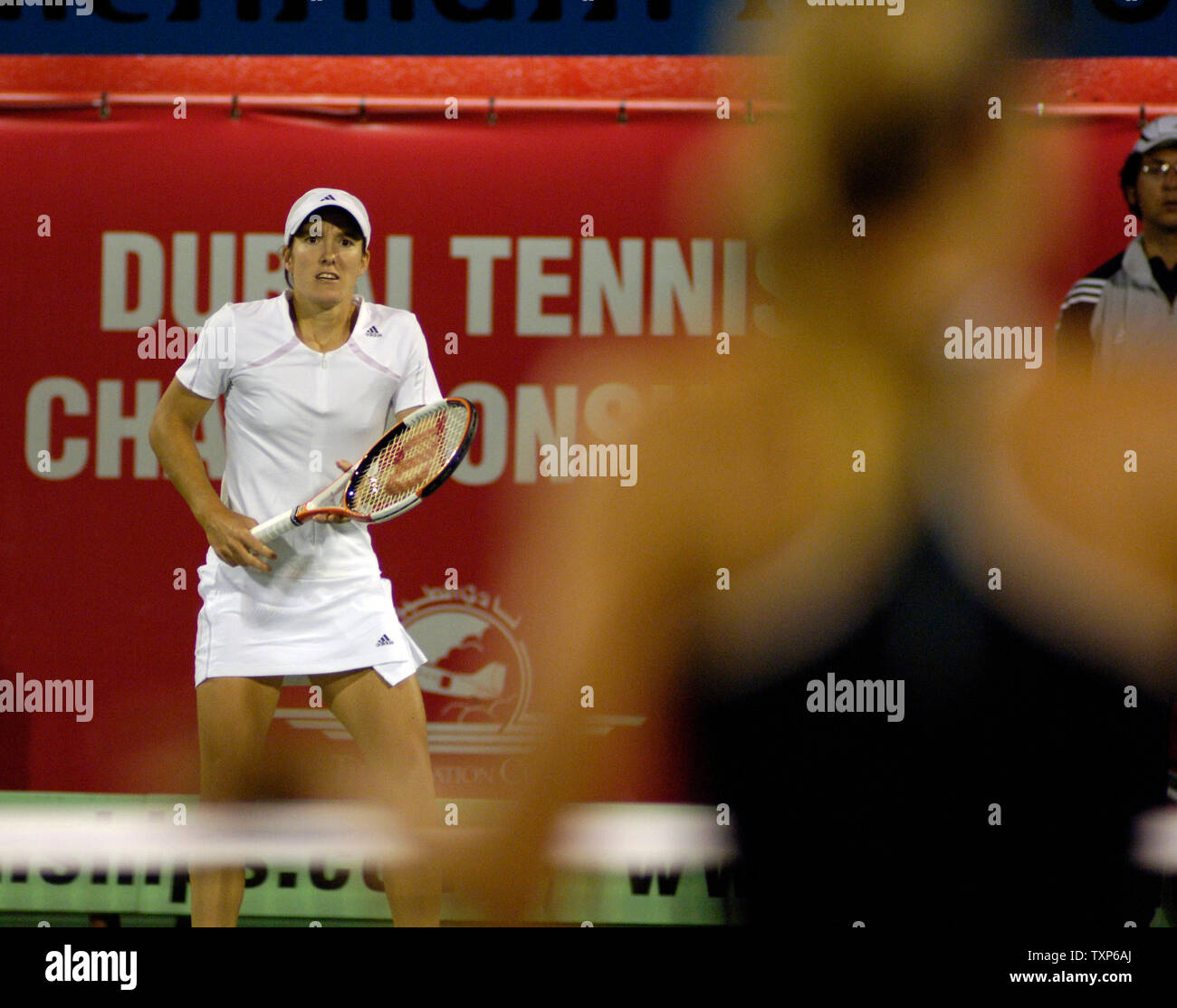 Justine Henin-Hardenne of Belgium(L) defeated Maria Sharpova of Russia(R)  7-5, 6-2 in the finals of the Dubai Tennis Championships in Dubai, United  Arab Emirates on February 25, 2006. Justine won US$ 159,000.00