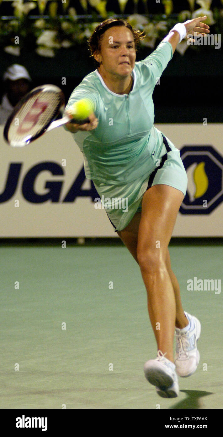 Justine Henin-Hardenne of Belgium seen with trophy after defeating Maria  Sharpova of Russia 7-5, 6-2 in the finals of the Dubai Tennis Championships  in Dubai, United Arab Emirates on February 25, 2006.