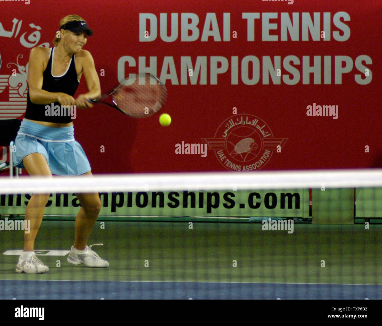 Justine Henin-Hardenne of Belgium(L) defeated Maria Sharpova of Russia(R)  7-5, 6-2 in the finals of the Dubai Tennis Championships in Dubai, United  Arab Emirates on February 25, 2006. Justine won US$ 159,000.00