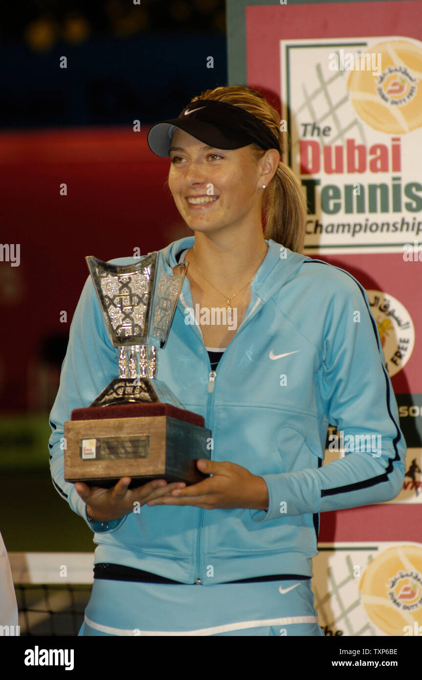 Justine Henin-Hardenne of Belgium(L) defeated Maria Sharpova of Russia(R)  7-5, 6-2 in the finals of the Dubai Tennis Championships in Dubai, United  Arab Emirates on February 25, 2006. Justine won US$ 159,000.00