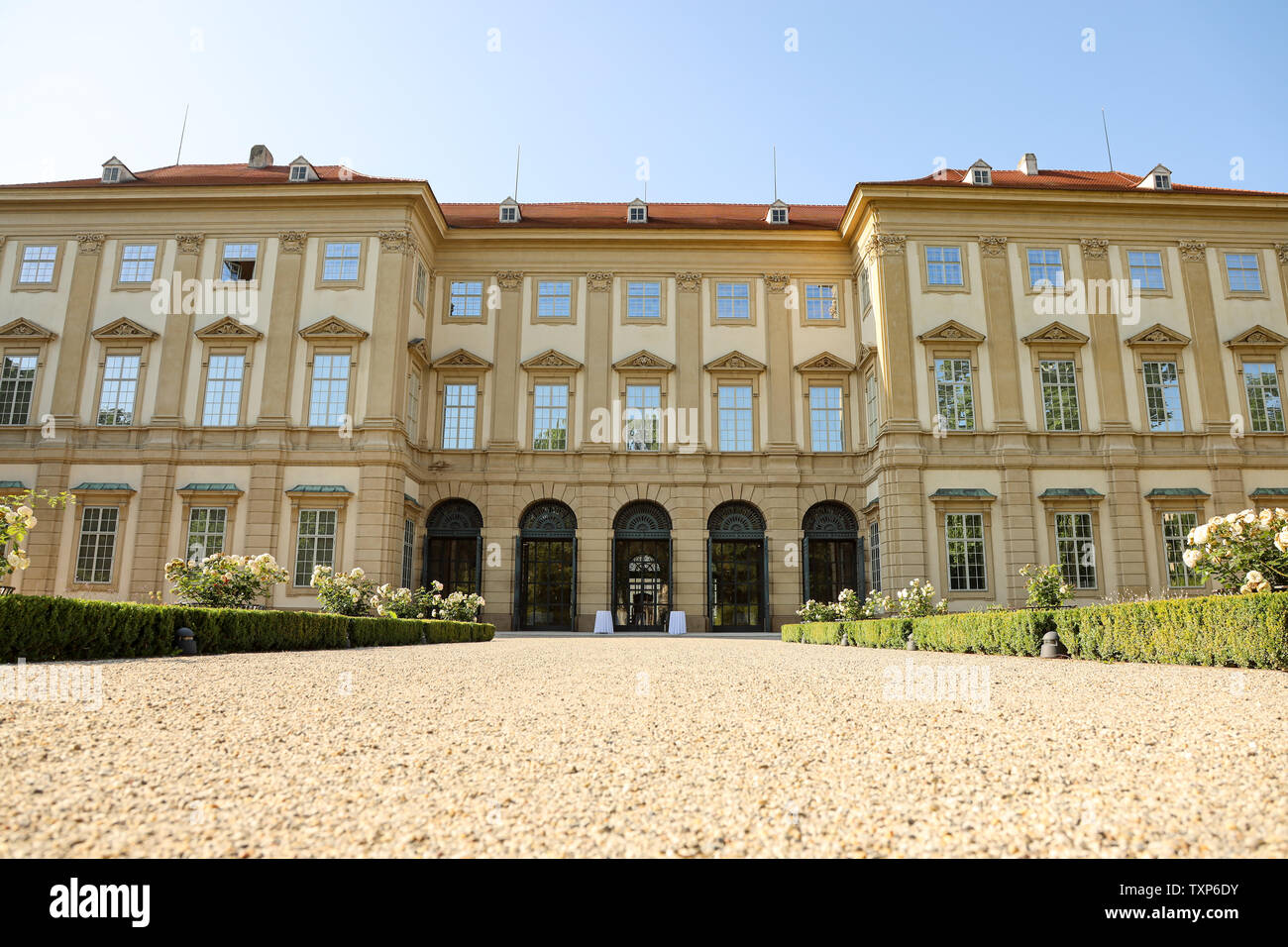 Back view of Palais Liechtenstein, surrounded by the park Stock Photo