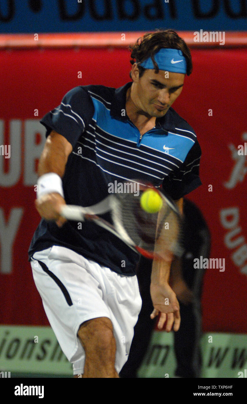 The world's number one tennis player Roger Federer returns the ball back  from Germany's Tommy Haas during the semi finals of the Men's Dubai Tennis  Championships on March 2, 2007. Federer won