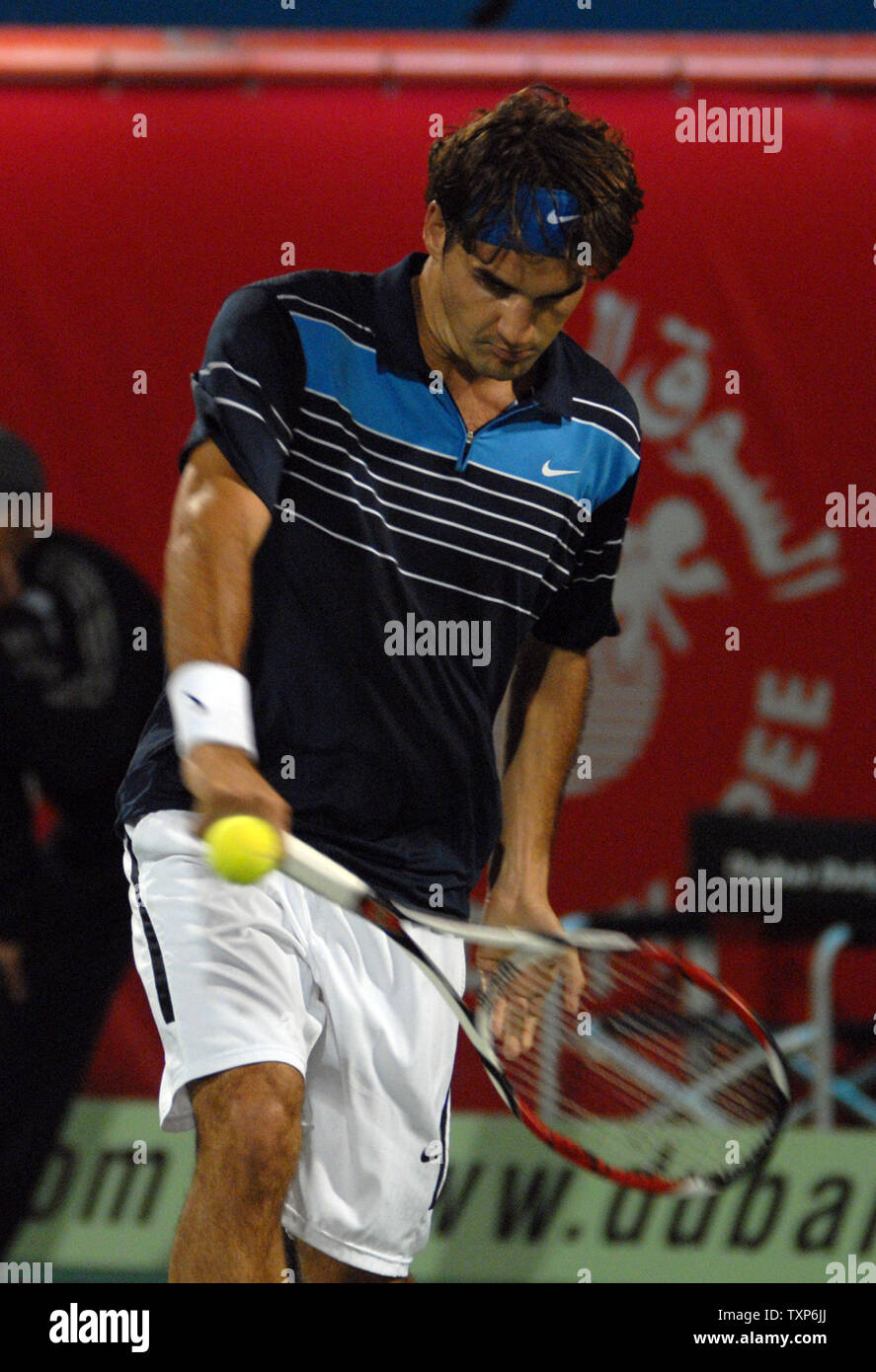 The world's number one tennis player Roger Federer returns the ball