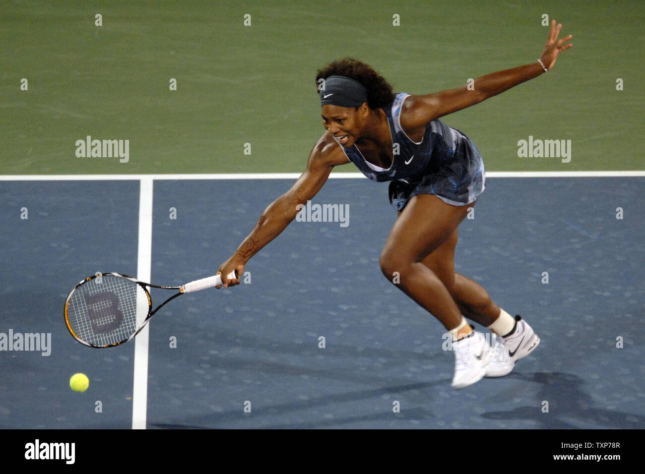 The world No. 1, Serena Williams from the United States returns the ball from her opponent Jie Zheng, the world No. 20, from China on the fourth day of the Women's Dubai Championships,  Wednesday February 18, 2009.  Williams won the match 6-4, 6-2. (UPI Photo/Norbert Schiller) Stock Photo