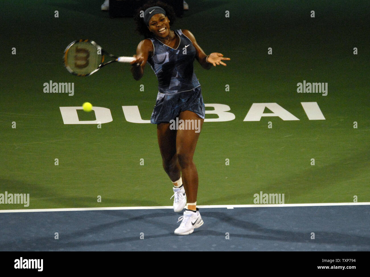 The world No. 1, Serena Williams from the United States returns the ball from her opponent Jie Zheng, the world No. 20, from China on the fourth day of the Women's Dubai Championships,  Wednesday February 18, 2009.   Williams won the match 6-4, 6-2.(UPI Photo/Norbert Schiller) Stock Photo