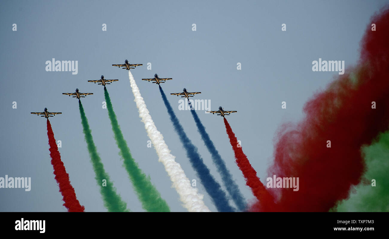 The United Arab Emirates Air Force aerobatic display team, called 'Al  Fursan' (The Knights), flies in formation during the 2015 Dubai Air Show,  on November 9, 2015 in Dubai, UAE. The air
