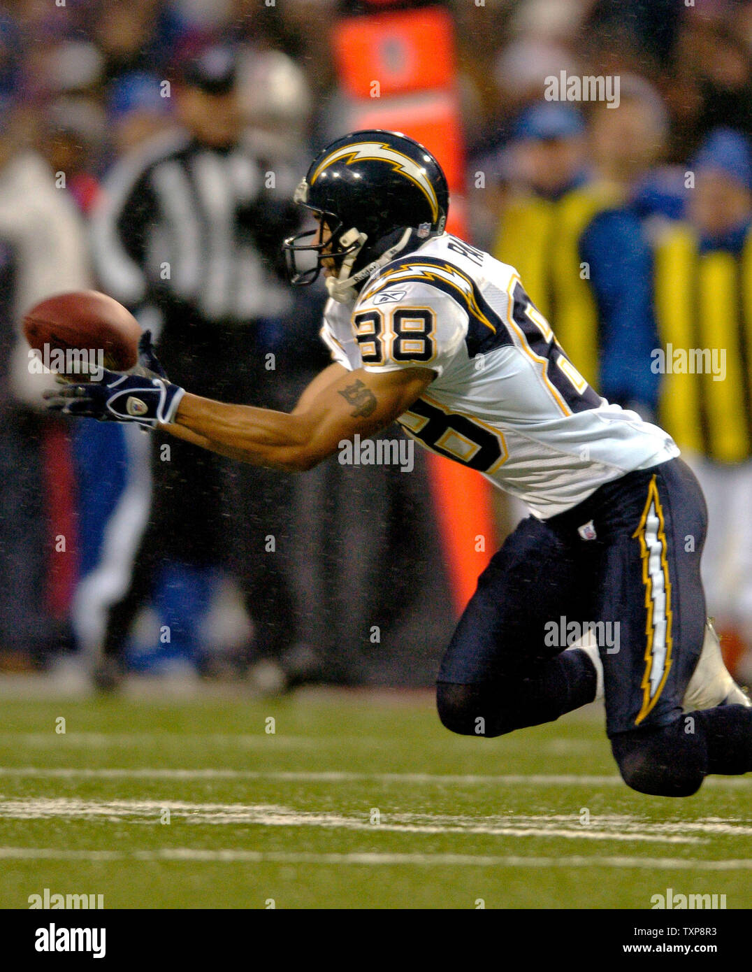 San Diego Chargers' Wide Receiver Eric Parker #88 (right) carries the ball  after a long reception to a touch down during game action, December 12,  2004, against the Tampa Bay Buccaneers' in