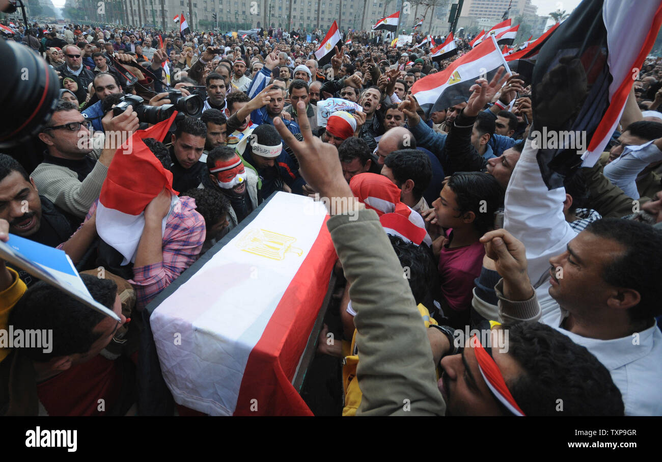 Egyptian anti-government demonstrators hold a symbolic funeral for colleague Ahmed Mohammed Mahmud , killed during clashes with pro-government supporters on February 4, at Cairo's Tahrir Square on February 7, 2011 on the 14th day of protests calling for the ouster of President Hosni Mubarak. UPI Stock Photo