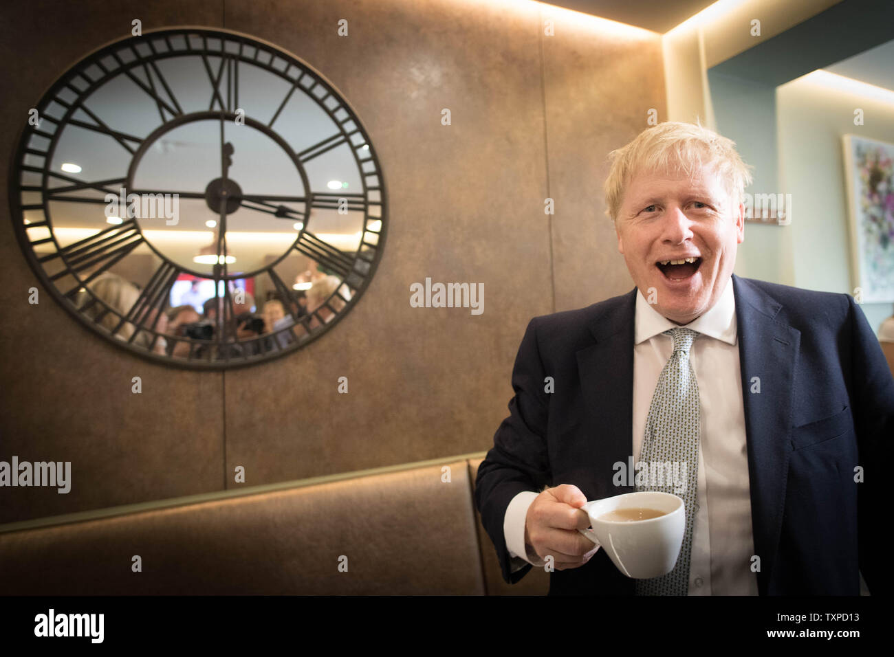 Conservative party leadership candidate Boris Johnson has a drink in the Munch and Wiggles cafe in Oxshott, Surrey. Stock Photo