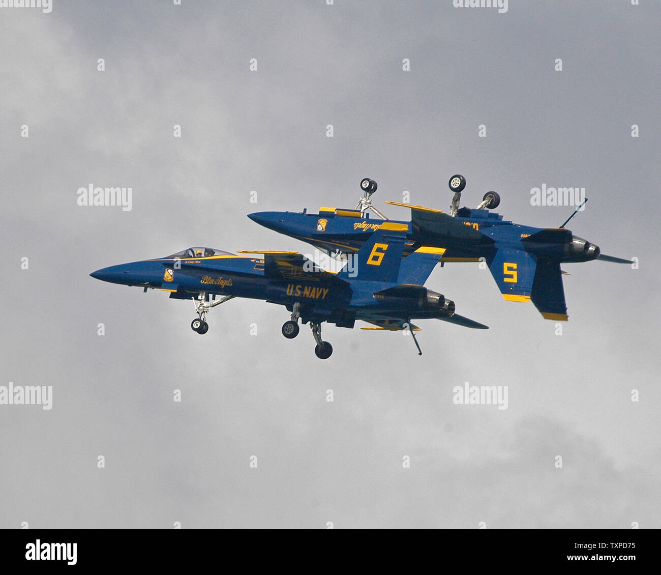 Two of the Navy Blue Angels Precision Flying Team perform an inverted ...