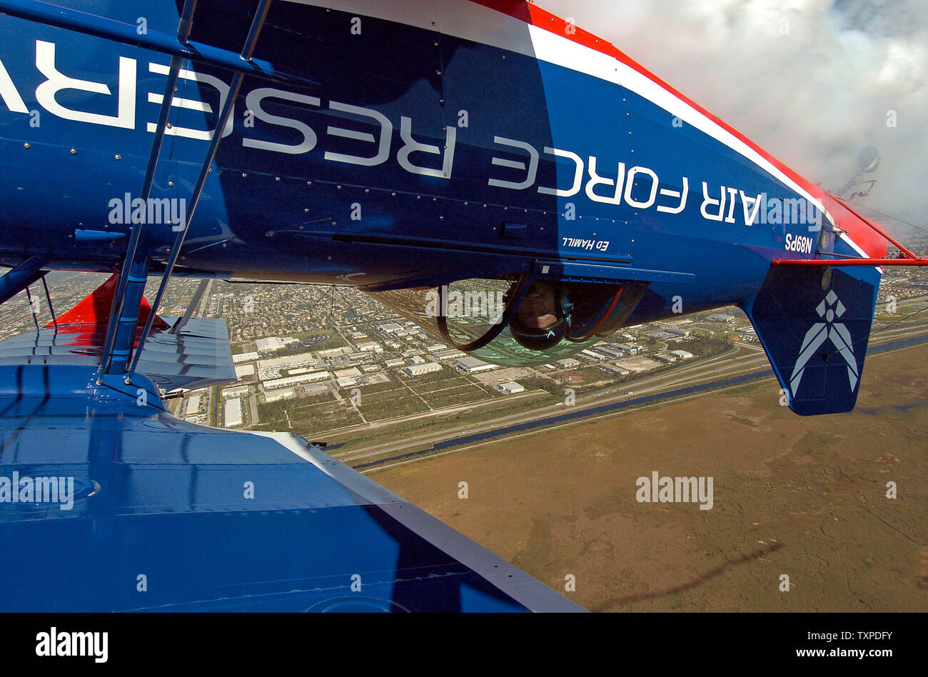 US Air Force Reserve Pilot Ed Hamill flies inverted over Pompano Beach Florida on May 3, 2006. He is one of the aerobatic performers  scheduled to participate in the McDonalds Air and Sea Show in Ft. Lauderdale, Fl. on May 6 and 7th. (UPI Photo/Joe Marino-Bill Cantrell) Stock Photo