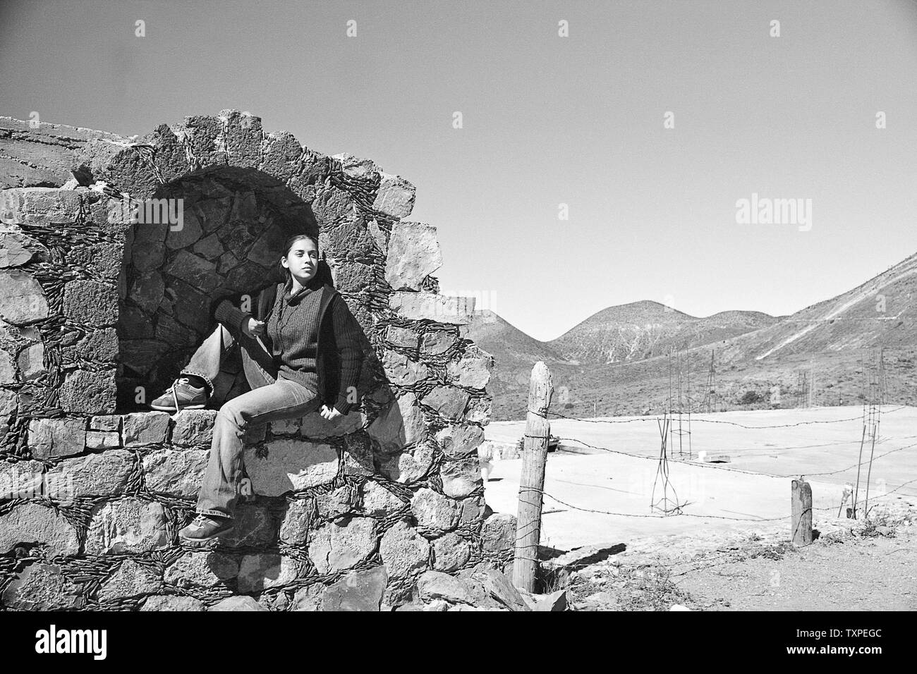 REAL DE CATORCE, SLP/MEXICO - NOV 18, 2002: Outdoor portrait of mexican young women touring the town. Stock Photo